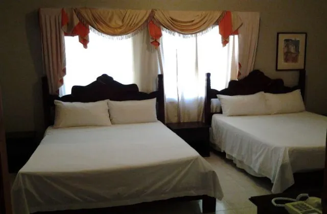 Aparta hotel Green House Santo Domingo habitacion 2 grands lits